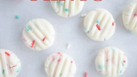 Colorful funfetti cream cheese mints on a decorative plate