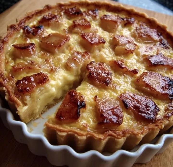 Rhubarb Custard Tart with a golden crust and fresh rhubarb topping