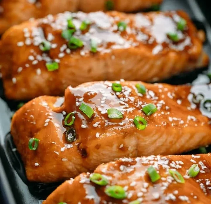 Asian Salmon with Homemade Teriyaki Sauce plated with garnish