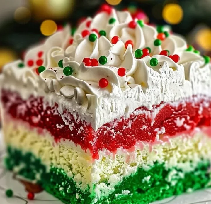 Delicious Christmas Poke Cake decorated for the festive season.