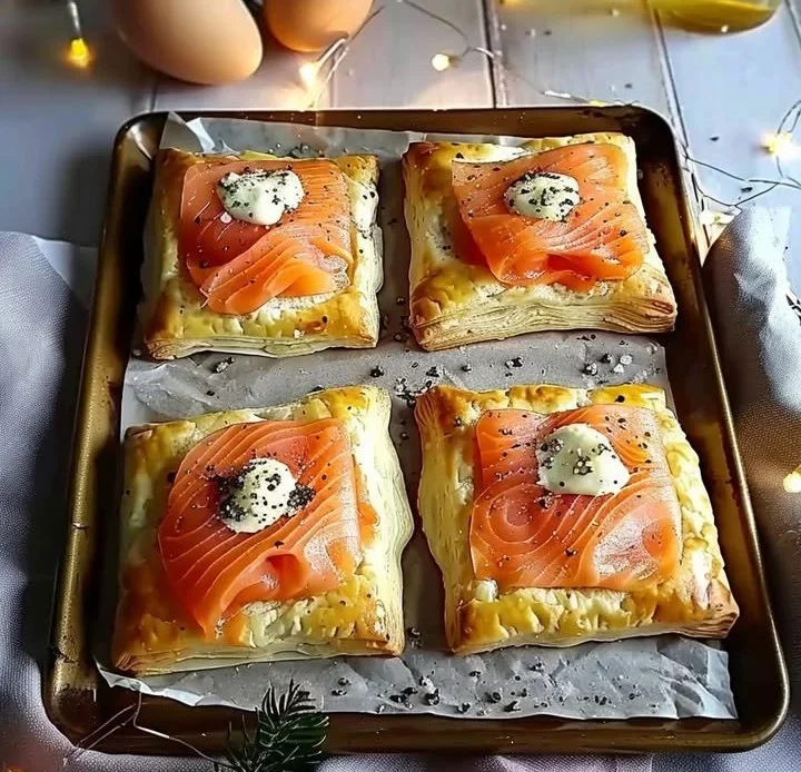 Christmas smoked salmon and cheese puff pastry pockets on a festive table
