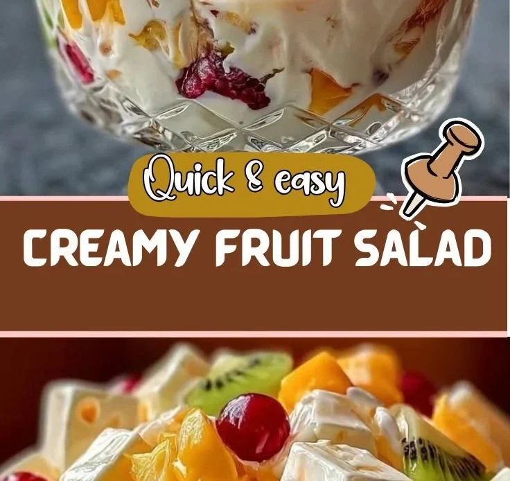 Delicious creamy fruit salad in a bowl topped with fresh mint