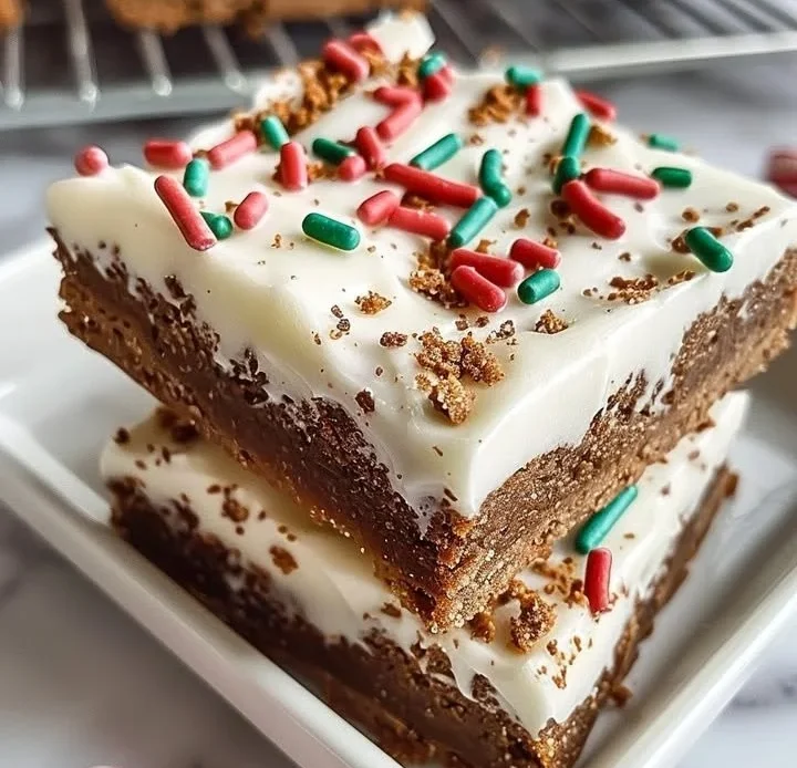Delicious gingerbread cookie bars topped with icing and festive decorations