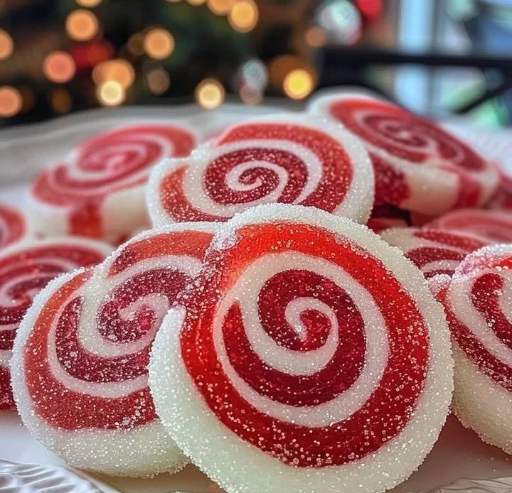 Colorful peppermint candy swirls on a festive background