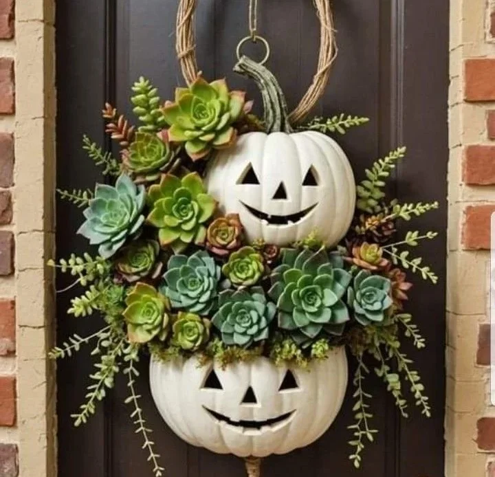 DIY pumpkin door hanger with succulent arrangement for autumn decoration