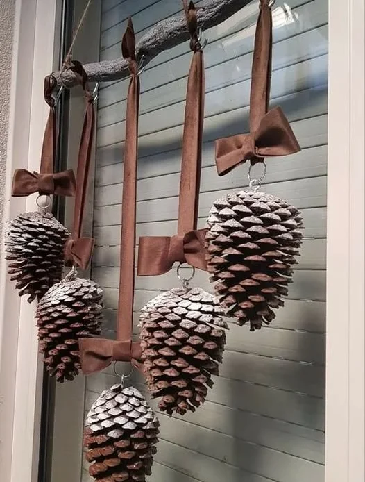 Decorative hanging pine cone idea for nature-themed home decor.